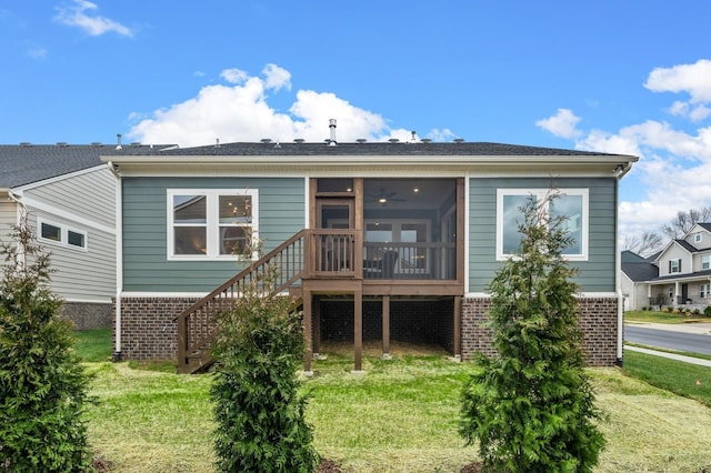 1005 Cherry Tree Dr, Mount Juliet, TN 37122 - back of house with stairs, a sunroom, a yard, and brick siding