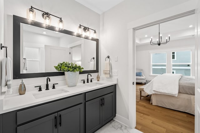 1005 Cherry Tree Dr, Mount Juliet, TN 37122 - full bath with ensuite bathroom, double vanity, a chandelier, baseboards, and recessed lighting