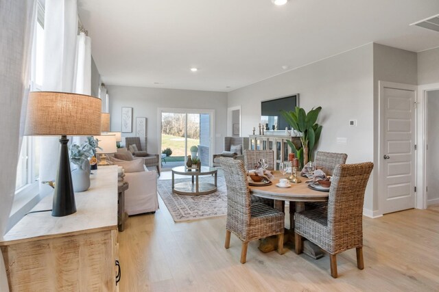 6482 Japonica Ln, White House, TN 37188 - dining room featuring light wood-style flooring and recessed lighting