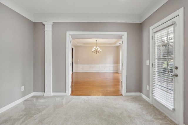 102 Oglethorpe Ave, Gallatin, TN 37066 - unfurnished room featuring carpet floors, ornamental molding, a chandelier, and baseboards