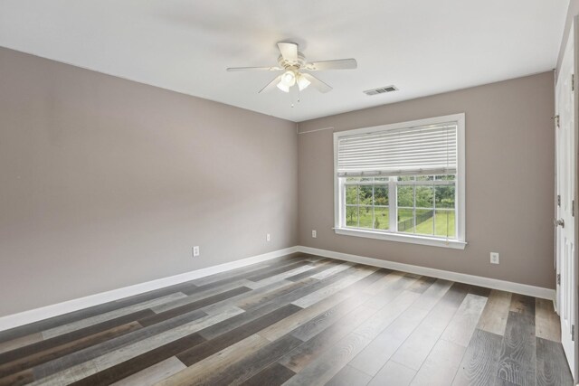 102 Oglethorpe Ave, Gallatin, TN 37066 - spare room with baseboards, a ceiling fan, and dark wood-style floors