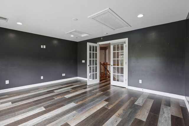 102 Oglethorpe Ave, Gallatin, TN 37066 - spare room with attic access, french doors, baseboards, wood finished floors, and recessed lighting