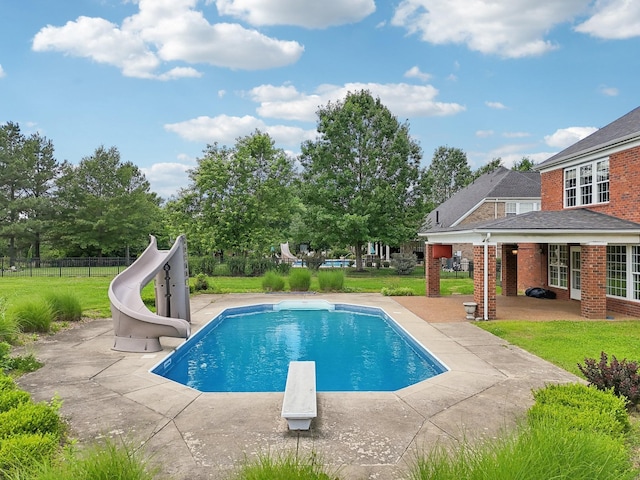102 Oglethorpe Ave, Gallatin, TN 37066 - swimming pool with a water slide, a diving board, and a patio area