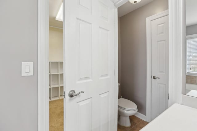 102 Oglethorpe Ave, Gallatin, TN 37066 - bathroom featuring baseboards, toilet, and tile patterned flooring