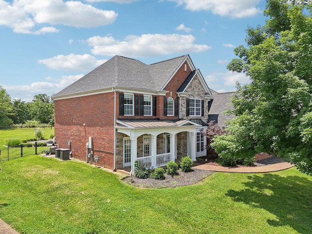 102 Oglethorpe Ave, Gallatin, TN 37066 - view of front of property featuring a porch, stone siding, cooling unit, and a shingled roof