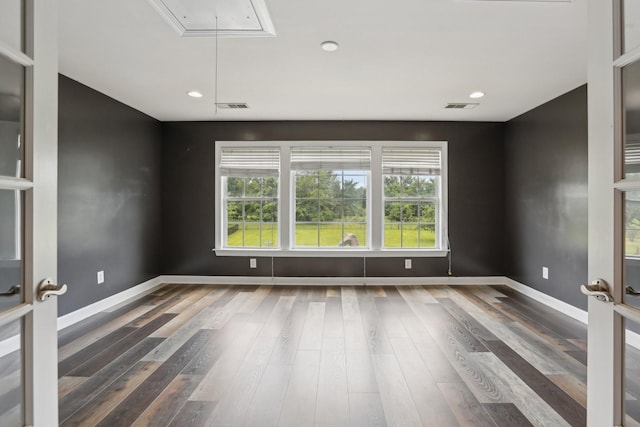 102 Oglethorpe Ave, Gallatin, TN 37066 - unfurnished room with attic access, baseboards, wood finished floors, and recessed lighting