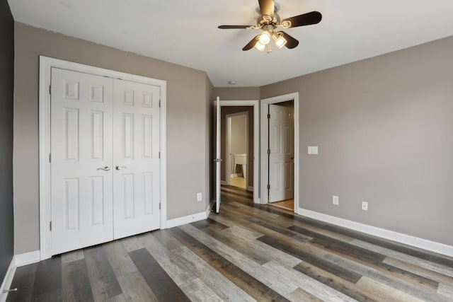 102 Oglethorpe Ave, Gallatin, TN 37066 - unfurnished bedroom with baseboards, a closet, wood finished floors, and a ceiling fan