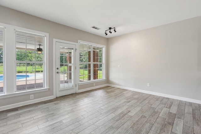102 Oglethorpe Ave, Gallatin, TN 37066 - empty room with baseboards, healthy amount of natural light, and light wood finished floors