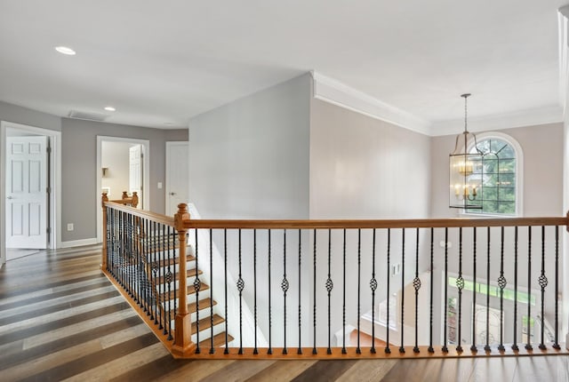 102 Oglethorpe Ave, Gallatin, TN 37066 - corridor with wood finished floors, a chandelier, recessed lighting, crown molding, and an upstairs landing