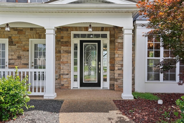 102 Oglethorpe Ave, Gallatin, TN 37066 - view of exterior entry featuring stone siding and a porch