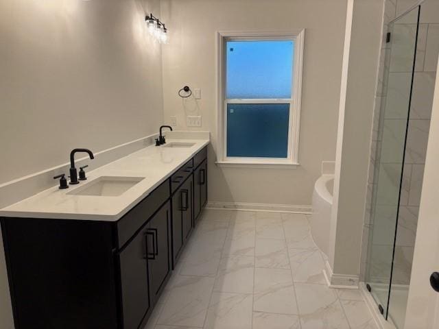 1320 Ashton Park Dr, Mount Juliet, TN 37122 - bathroom with marble look tiles, a garden tub, a shower stall, double vanity, and baseboards