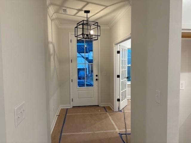 1320 Ashton Park Dr, Mount Juliet, TN 37122 - entryway featuring a chandelier, ornamental molding, baseboards, and concrete floors