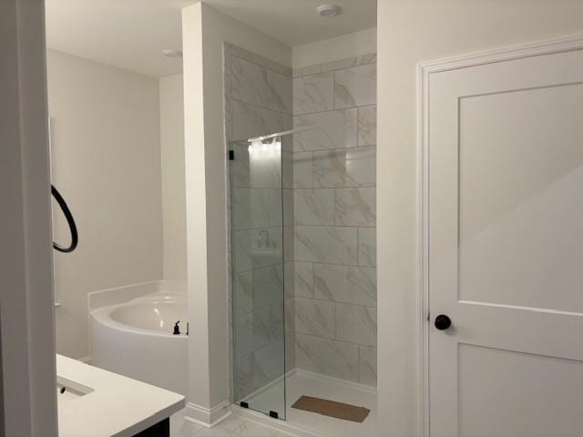1320 Ashton Park Dr, Mount Juliet, TN 37122 - bathroom featuring a shower stall, vanity, baseboards, and a tub