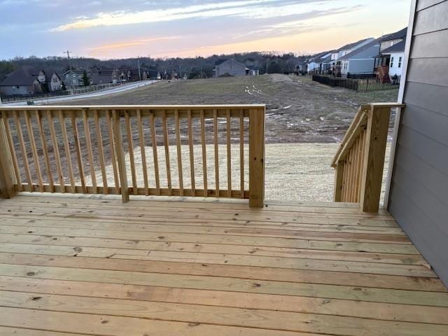 1320 Ashton Park Dr, Mount Juliet, TN 37122 - deck at dusk featuring a residential view