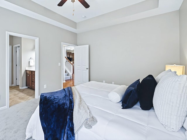 2438 Arden Village Dr, Columbia, TN 38401 - bedroom with light carpet, a raised ceiling, a ceiling fan, and ensuite bathroom
