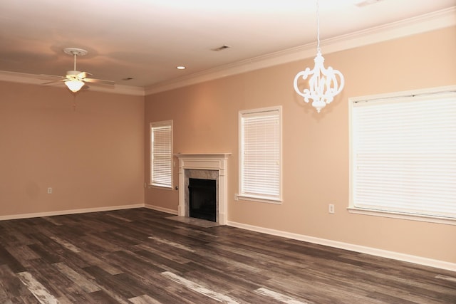 1321 Crofton Park Dr, Columbia, TN 38401 - unfurnished living room with crown molding, a fireplace with flush hearth, dark wood finished floors, a chandelier, and ceiling fan