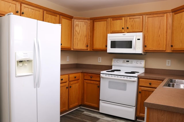 1321 Crofton Park Dr, Columbia, TN 38401 - kitchen with white appliances, dark wood-type flooring, and brown cabinetry