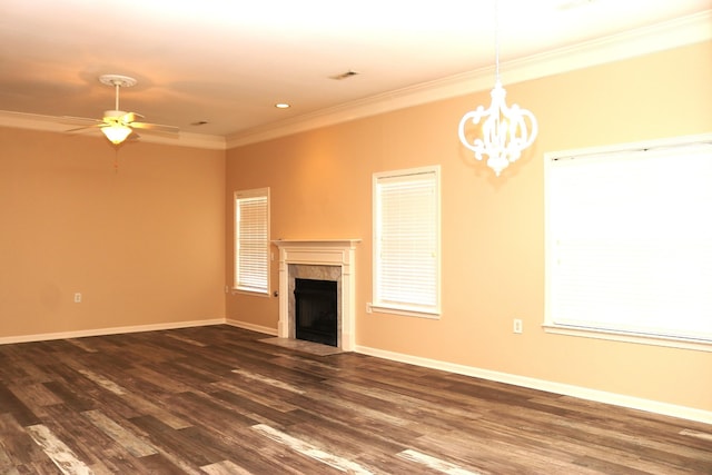 1321 Crofton Park Dr, Columbia, TN 38401 - unfurnished living room with ornamental molding, a fireplace with flush hearth, dark wood-type flooring, a chandelier, and ceiling fan