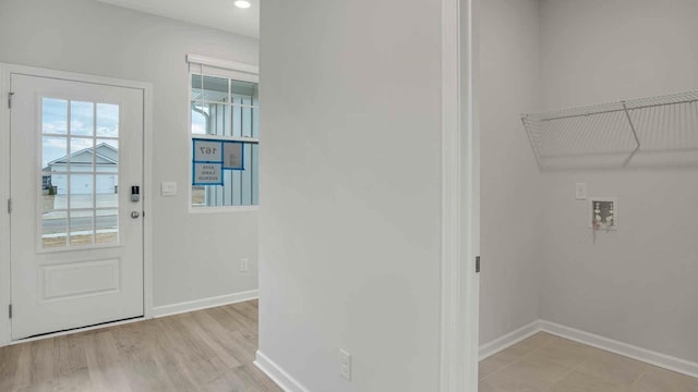 6454 Japonica Ln, White House, TN 37188 - laundry area with baseboards and washer hookup