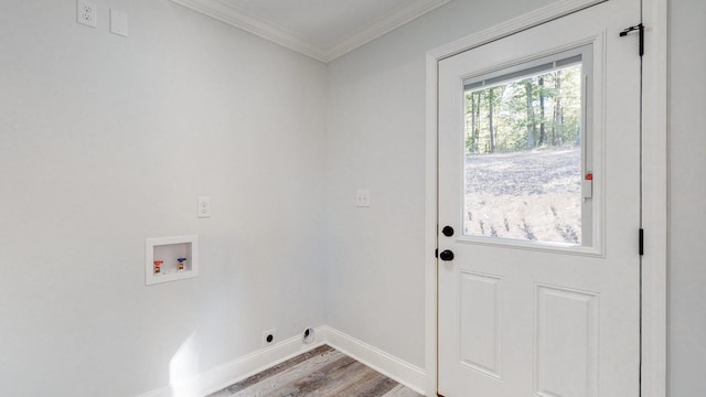 9716 Campbellsville Rd, Pulaski, TN 38478 - washroom featuring washer hookup, wood finished floors, ornamental molding, baseboards, and hookup for an electric dryer