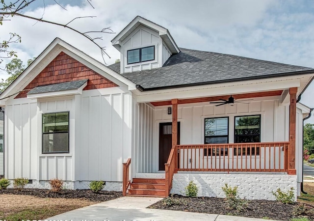 9716 Campbellsville Rd, Pulaski, TN 38478 - view of front facade featuring board and batten siding, covered porch, a shingled roof, and ceiling fan