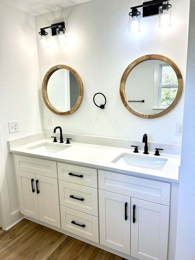 9710 Campbellsville Rd, Pulaski, TN 38478 - full bath with double vanity and wood finished floors