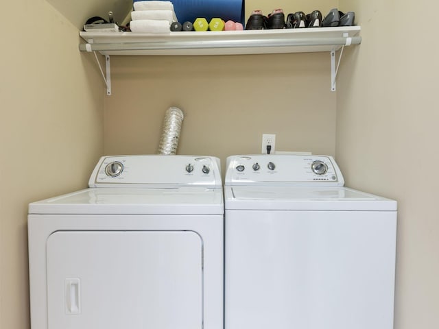 5007 Buds Farm Ln, Franklin, TN 37064 - laundry room featuring washing machine and dryer