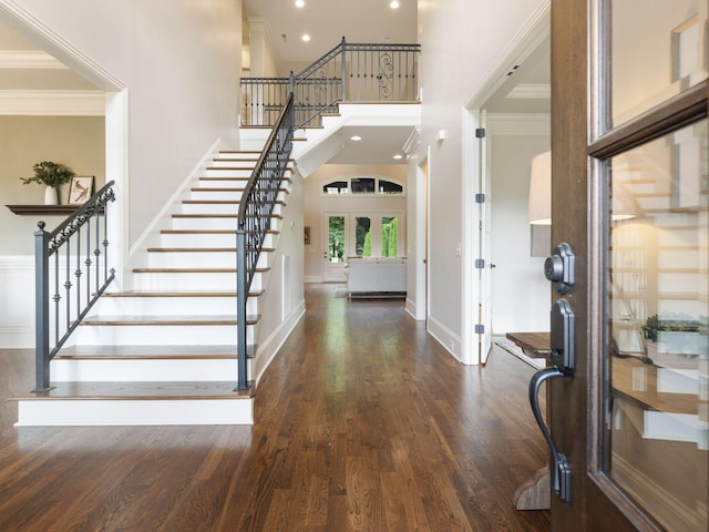 5007 Buds Farm Ln, Franklin, TN 37064 - entryway with stairway, a towering ceiling, wood finished floors, crown molding, and baseboards