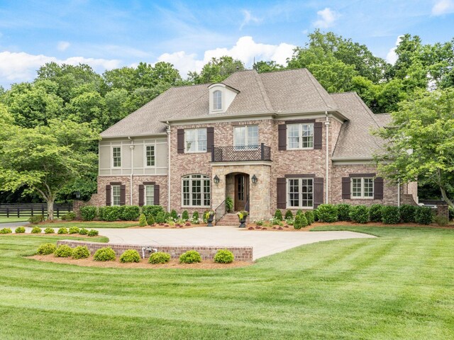 5007 Buds Farm Ln, Franklin, TN 37064 - colonial-style house with brick siding and a shingled roof
