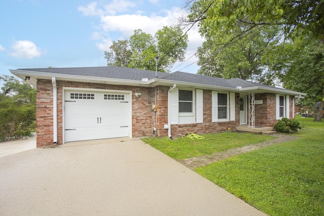 102 Ryburn Dr, Old Hickory, TN 37138 - single story home with a garage, driveway, a front lawn, and brick siding