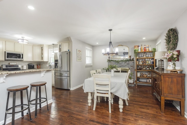 102 Ryburn Dr, Old Hickory, TN 37138 - dining space with dark wood-style floors, recessed lighting, baseboards, and a chandelier