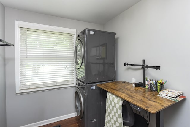102 Ryburn Dr, Old Hickory, TN 37138 - laundry room with estacked washer and dryer, baseboards, a desk, and dark wood-style floors