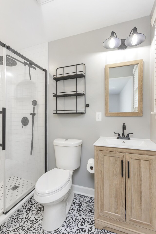 102 Ryburn Dr, Old Hickory, TN 37138 - bathroom with toilet, vanity, baseboards, and a shower stall
