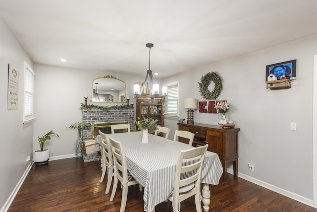 102 Ryburn Dr, Old Hickory, TN 37138 - dining room featuring wood finished floors, baseboards, a fireplace, recessed lighting, and a chandelier