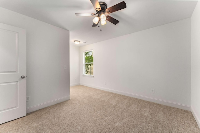 23 Hope Ct, Mount Juliet, TN 37122 - spare room featuring light carpet, baseboards, and a ceiling fan