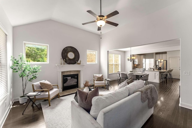 23 Hope Ct, Mount Juliet, TN 37122 - living room featuring a chandelier, a fireplace with flush hearth, ceiling fan, healthy amount of natural light, and vaulted ceiling
