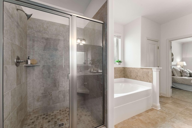 23 Hope Ct, Mount Juliet, TN 37122 - ensuite bathroom featuring a bath, a stall shower, and tile patterned floors