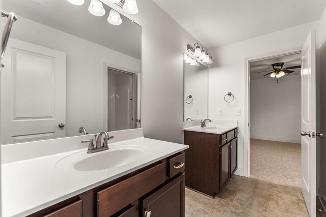 23 Hope Ct, Mount Juliet, TN 37122 - bathroom featuring two vanities and a ceiling fan