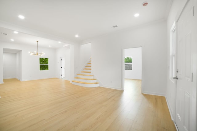 110 Spring Creek Rd, Estill Springs, TN 37330 - spare room with plenty of natural light, a chandelier, light wood-style flooring, stairway, and recessed lighting