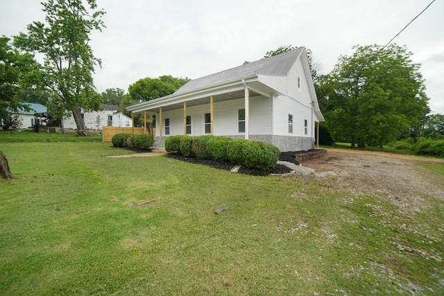 110 Spring Creek Rd, Estill Springs, TN 37330 - view of home's exterior with a porch and a yard