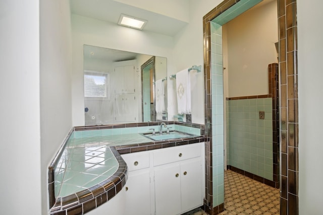 929 Deervale Dr, Nashville, TN 37217 - bathroom featuring vanity and tile walls