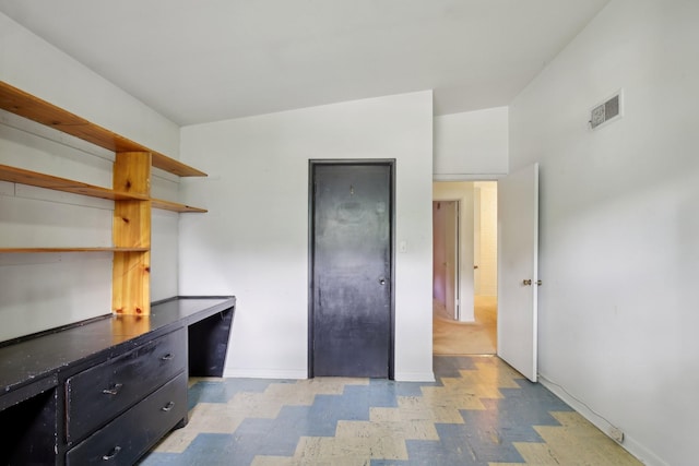 929 Deervale Dr, Nashville, TN 37217 - unfurnished bedroom with baseboards, a desk, and light floors