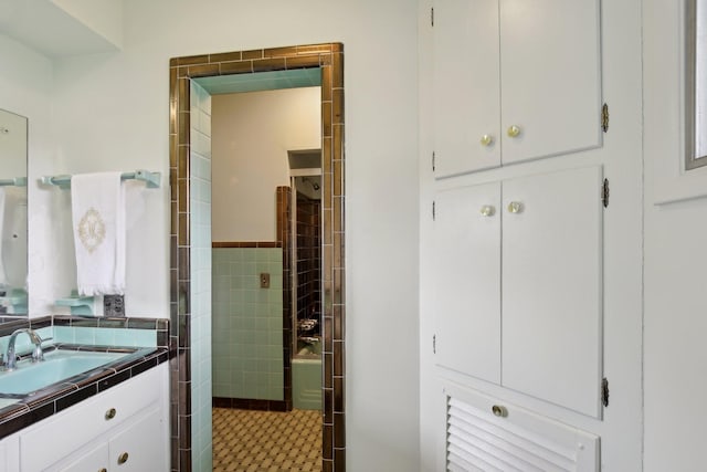 929 Deervale Dr, Nashville, TN 37217 - bathroom with vanity, tile walls, and a shower
