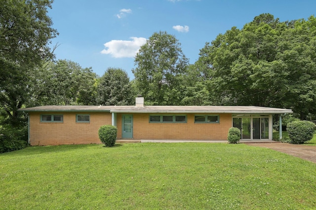 929 Deervale Dr, Nashville, TN 37217 - single story home with brick siding, a front yard, and a chimney