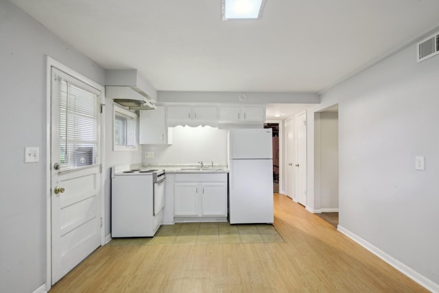 929 Deervale Dr, Nashville, TN 37217 - kitchen featuring white appliances, a sink, light wood-type flooring, light countertops, and white cabinetry