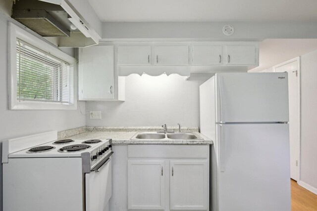 929 Deervale Dr, Nashville, TN 37217 - kitchen with white appliances, a sink, white cabinetry, and light countertops