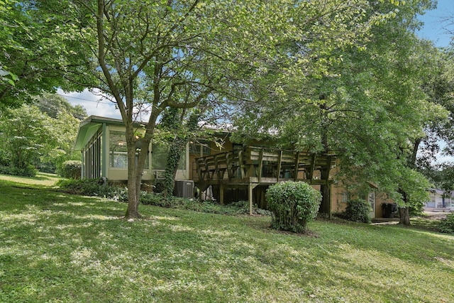 929 Deervale Dr, Nashville, TN 37217 - view of green lawn with central AC unit and a deck