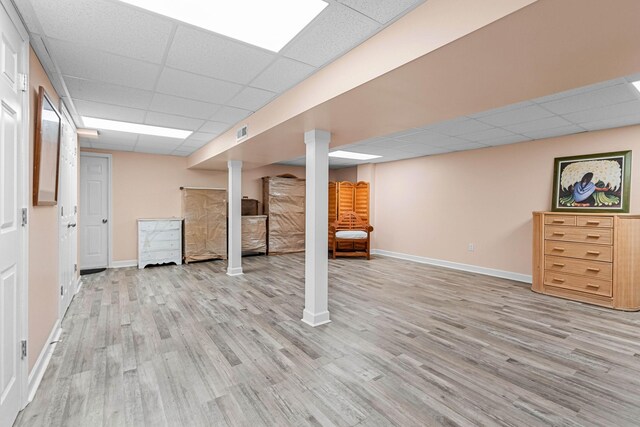 7214 Timberlane Dr, Fairview, TN 37062 - finished basement featuring a drop ceiling, light wood finished floors, and baseboards
