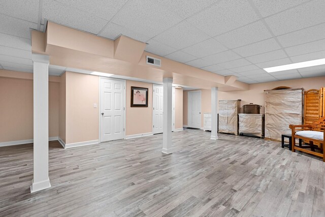 7214 Timberlane Dr, Fairview, TN 37062 - finished basement with a drop ceiling, wood finished floors, and baseboards