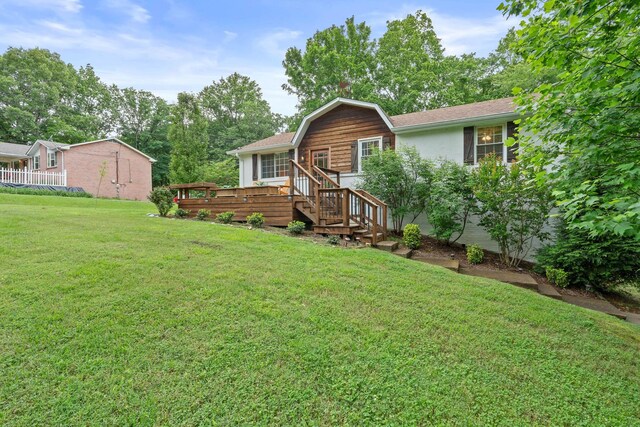 7214 Timberlane Dr, Fairview, TN 37062 - view of front of property featuring a front lawn, a deck, and a shingled roof